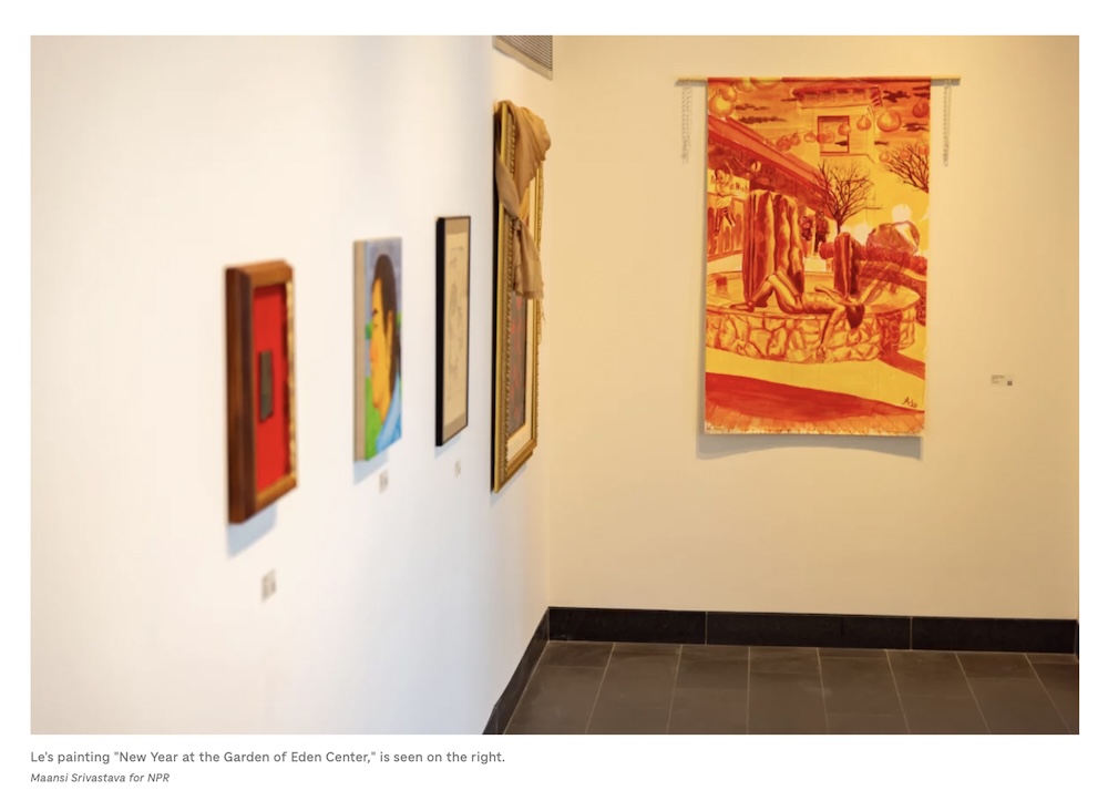 Le's painting "New Year at the Garden of Eden Center," is seen on the right. Photo by Maansi Srivastava for NPR