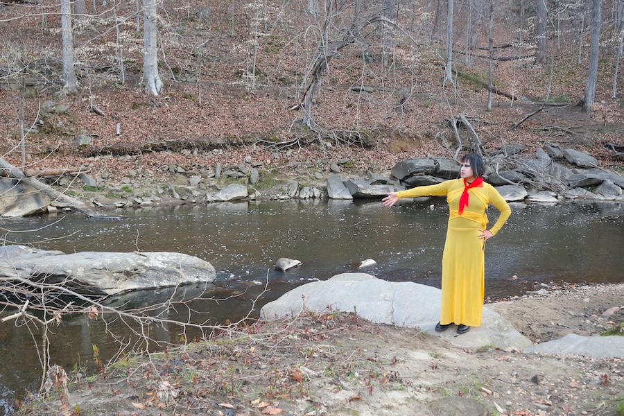 Production still of artist by the water | Photo courtesy Anthony Le